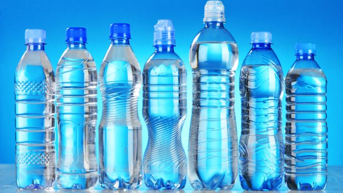 Composition with assorted plastic bottles of mineral water